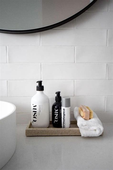 A vignette is a short piece of literature used to add depth or understanding to a story. Simple bathroom vignette featuring terrazzo tray styled ...