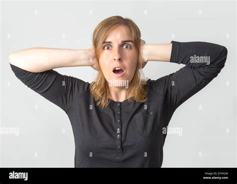 Surprised Woman On A White Background Stock Photo Alamy