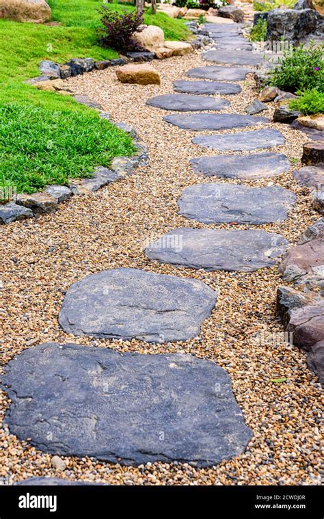 Stone Stepping Pathway In A Japanese Style Garden Stock Photo Alamy