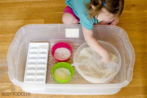 Scooping Rice Sensory Bin Busy Toddler