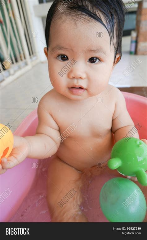Little Asian Girl Take Image And Photo Free Trial Bigstock
