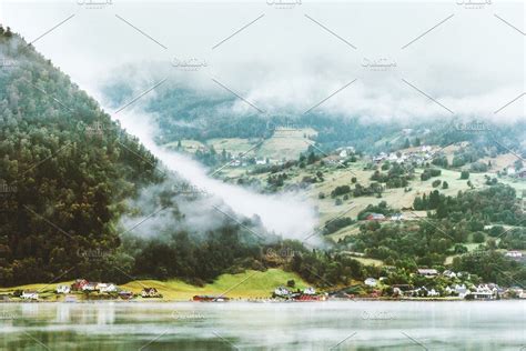 Foggy Forest Mountains And Fjord Featuring Village Scandinavia And