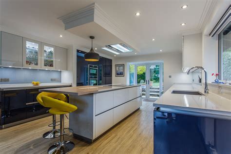 A Beautiful Contemporary Kitchen In Contrasting High Gloss White And