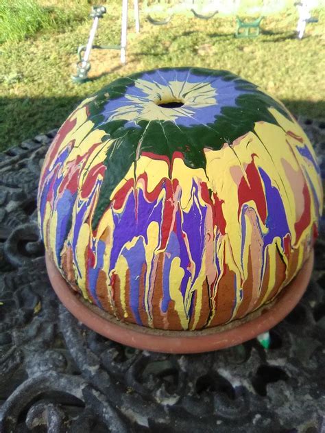 Saved by beau monde vintage. Colorful Hidden Outdoor Ashtray | Terra cotta pot crafts, Outdoor ashtray, Terracotta pots