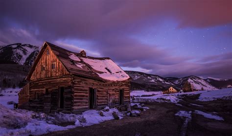 Cabin On Starry Winter Night