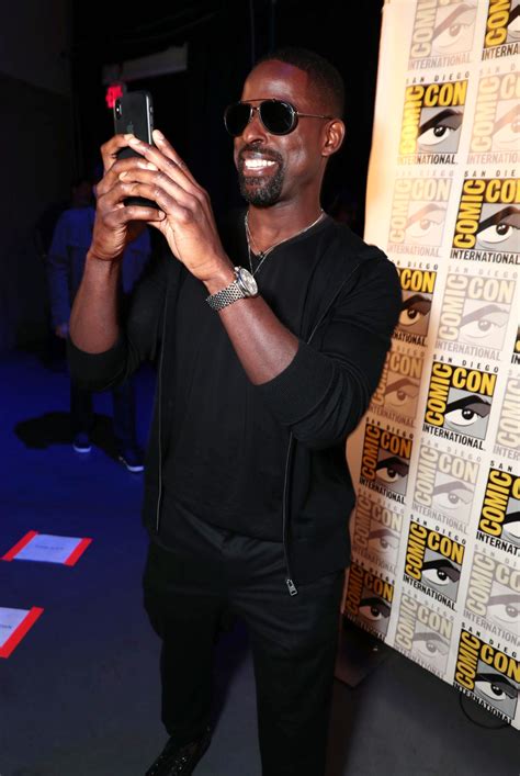 Brown is shot in the evening in the middle of a forest. SDCC 2018 Exclusive: Sterling K. Brown Talks The Predator - blackfilm.com/read | blackfilm.com/read