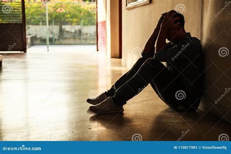 Emotional Moment Man Sitting Holding Head In Hands Stressed Sad Young