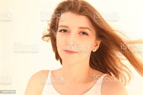 Woman Face With Hair Motion On White Background Isolated Close Stock