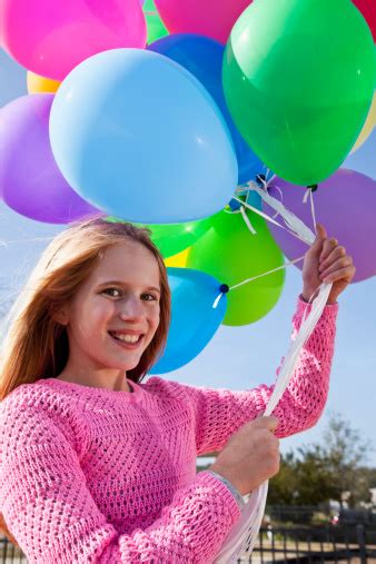 Girl Holding Balloons Stock Photo Download Image Now Istock