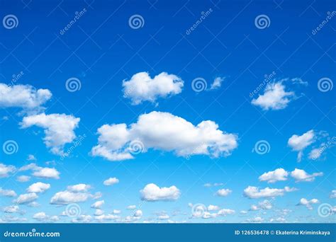 Many Little Fluffy Clouds In Blue Sky In Sunny Day Stock Photo Image