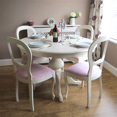 The top was manufactured not to separate for leaves. Beautiful White Round Kitchen Table and Chairs - HomesFeed