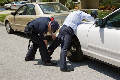 Police Pat Down Budge And Heipt