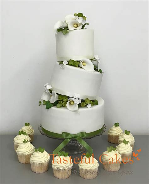 Sage green romantic love bird cake topper handmade pottery wedding gift with names and wedding date engraved under the nest. Tasteful Cakes By Christina Georgiou | Floral Sage Green Wedding Cake and Cupcakes.