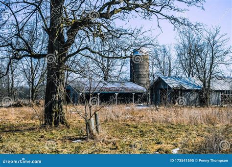 An Old Abandoned Farm On A Sunny Winter Day Stock Image Image Of Silo