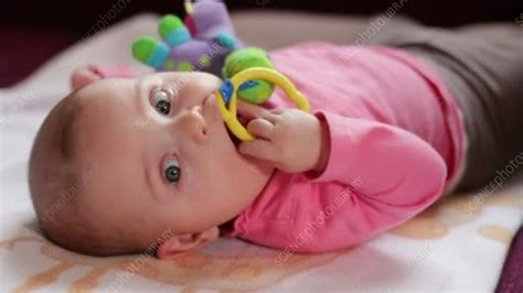 Baby With Toy Stock Video Clip K0055026 Science Photo Library