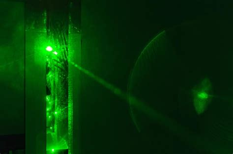 Premium Photo Green Laser Beam Of The Security System