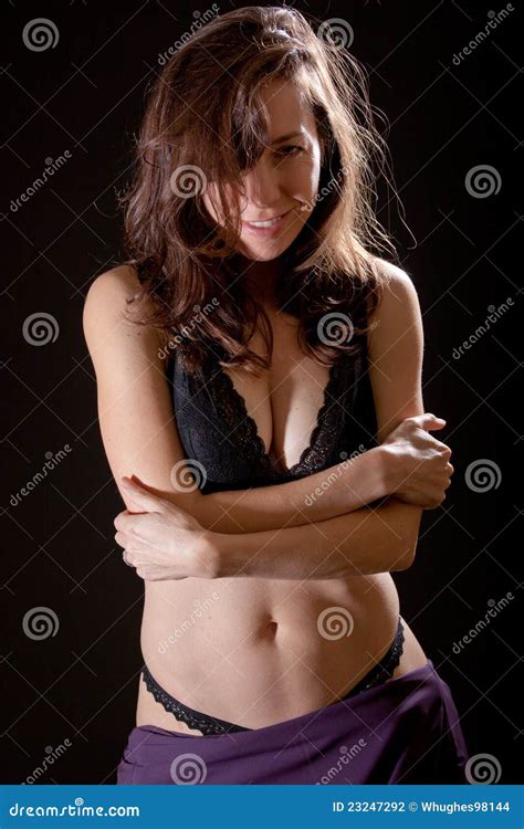 A Beautiful Sexy Woman Removing Her Dress Stock Photography Image