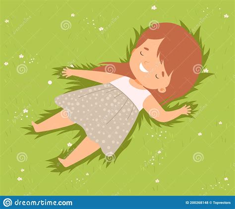 Happy Smiling Girl Lying Down On Green Lawn Cute Kid Having Fun