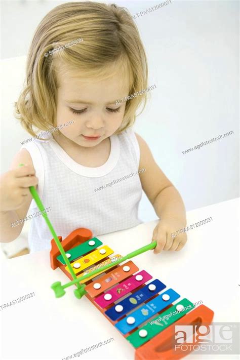 Toddler Girl Playing Xylophone High Angle View Stock Photo Picture