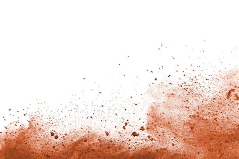 Premium Photo Brown Color Powder Explosion On White Background