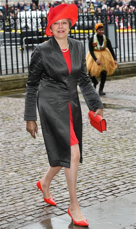 Theresa May Misses The Mark In Red And Black Outfit For Commonwealth