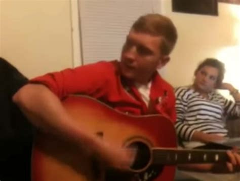 A Young Tyler Childers Performing In Front Of A Couple Friends In A