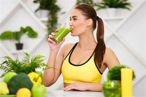 Healthy Lifestyle Slim Girl Drinking Smoothie After Training Stock