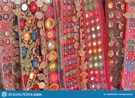 colorful-ethnic-belts-with-mirrors-at-market-in-goa,-india-tibetan
