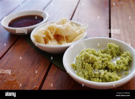 Dishes Of Green Wasabi Pickled Ginger And Soy Sauce Japanese