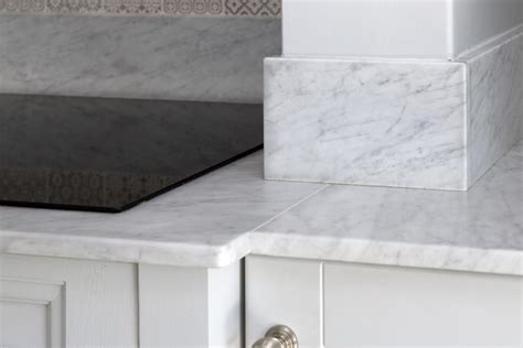 Marble worktops should be cleaned using hot soapy water and a soft cloth; Carrara Marble Kitchen Worktop | Henderstone