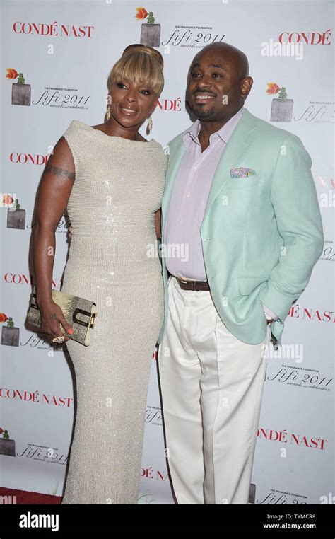 Mary J Blige In Gucci Dress And Steven Stoute Arriving At The 2011 Fifi