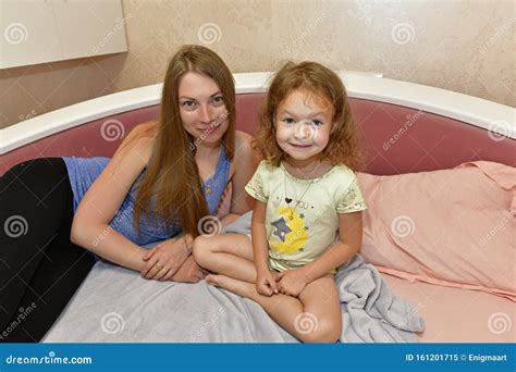 Aunt Puts Her Niece To Sleep In Bed Stock Image Image Of Laughing Agriculture