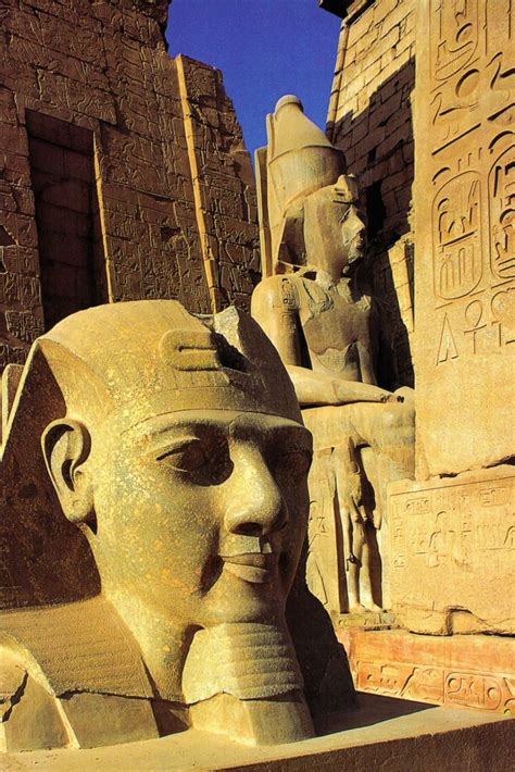 One Of Two Colossi Depicting King Ramesses Ii Seated On His Throne That Watched Over The