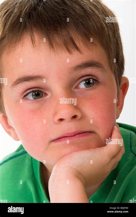 Young Boy Looking Bored Stock Photo Alamy
