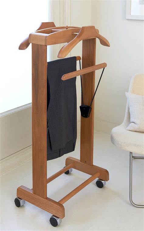 3 lifelike men's clothing valet suit stands. This fantastic Stuart Suit Valet Stand is designed and ...
