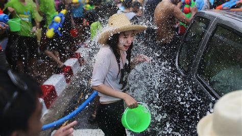 songkran thailand celebrates buddhist new year with water fights bbc news