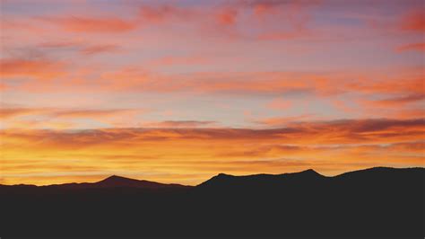Download Wallpaper 3840x2160 Sunset Mountains Horizon Clouds 4k Uhd