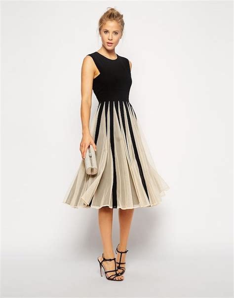 Dresses to fit every shape, style or budget. Winter Wedding Guest Dresses We Love - MODwedding