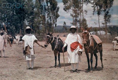 1931 Addis Ababa Ethiopia A Group Of Costumed Warriors Sit On The