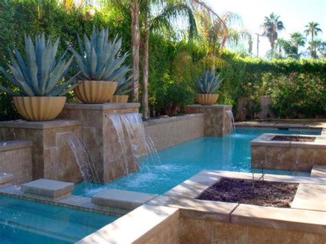The solar pool fountain moves the water from the pool, lifting it into the air to create waterfalls which then create splashes by hitting the water, collecting in the pool again. 20 Exquisite Waterfalls Designs for Pools Inground