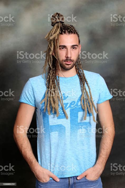Attractive Blonde Male Model With Combination Of Braids And Dreadlocks