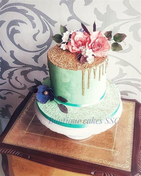 Gold And Teal Flowers Cake Decorated Cake By Ddelev Cakesdecor