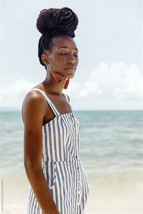 Portrait Of A Beautiful African American Woman At The Beach By