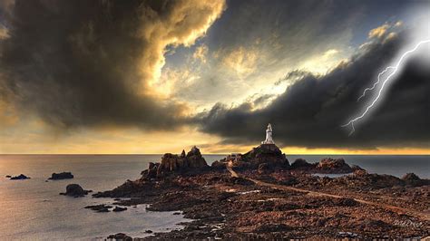 Storm Over Lighthouse Rocks Shore Lightning Jetty Storm