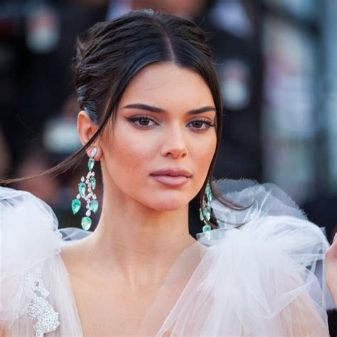 kendall jenner just stripped down to the tiniest string bikini and fur boots in aspen—her body