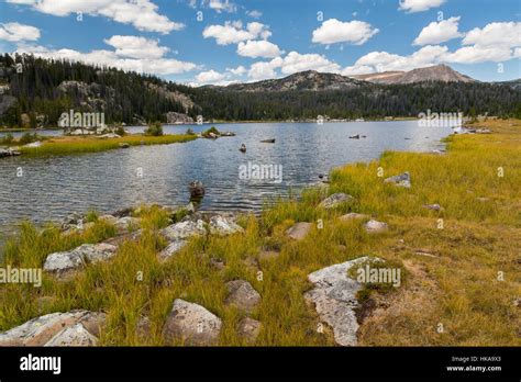 Stockade Lake Below Peaks Of The Beartooth Mountains Along The