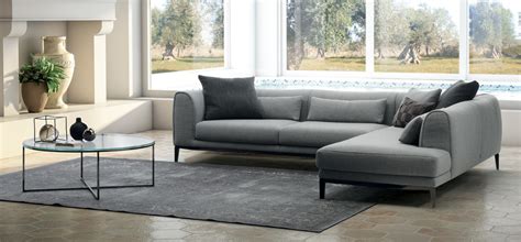 At natuzzi factory clearance & in stock sale offers sofa outlet we bring you the very best in stock offers like this taupe genuine cowhide italian luxury leather three seater +2 seater sofa set at the low cheapest possible uk price of £2499. Trevi | NATUZZI ITALIA