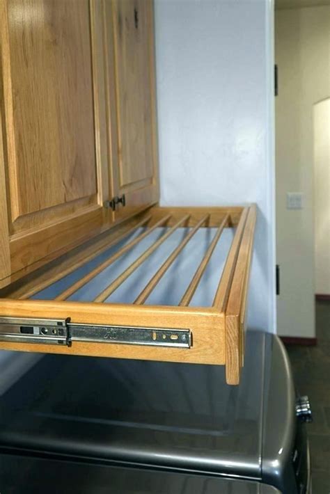A great tool for saving your home space and making your home more organized. Image result for pull out drying rack | Clothing rack ...