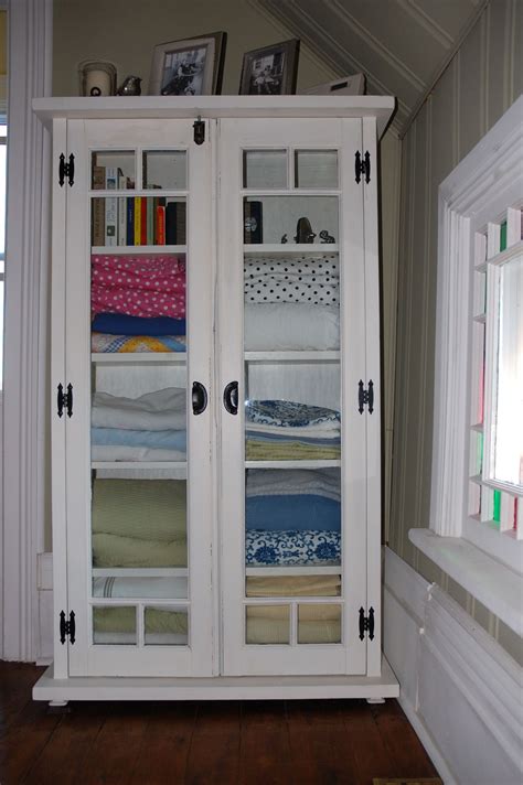See more ideas about linen cabinet, cabinet, bathroom linen cabinet. Old windows used as linen cabinet doors. | Used cabinets ...