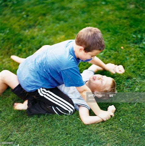 Two Boys Fighting High Res Stock Photo Getty Images